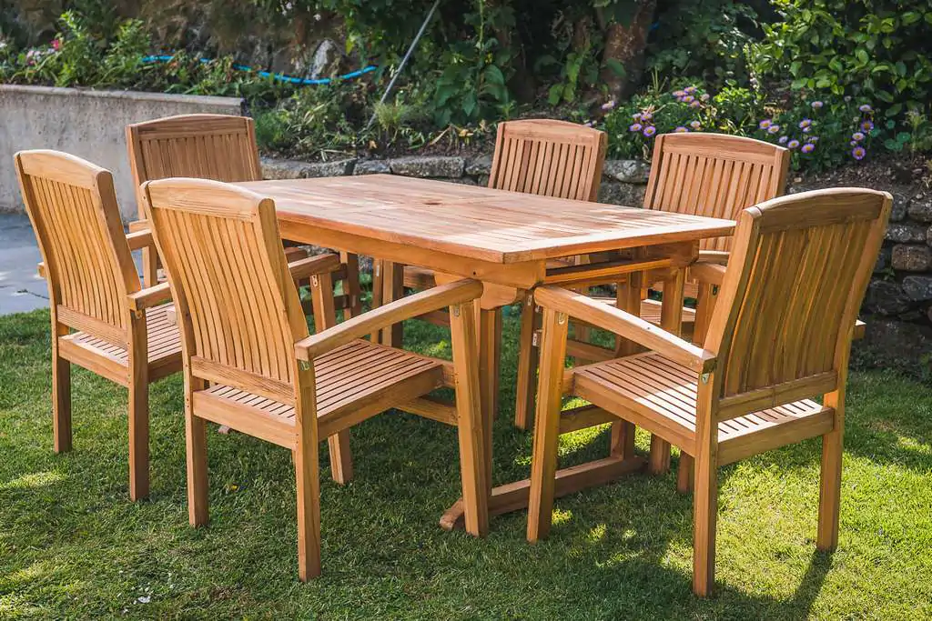 Solid Teak 1.6m Rectangular Chunky Pedestal Table with 6 Charlotte stacking chairs