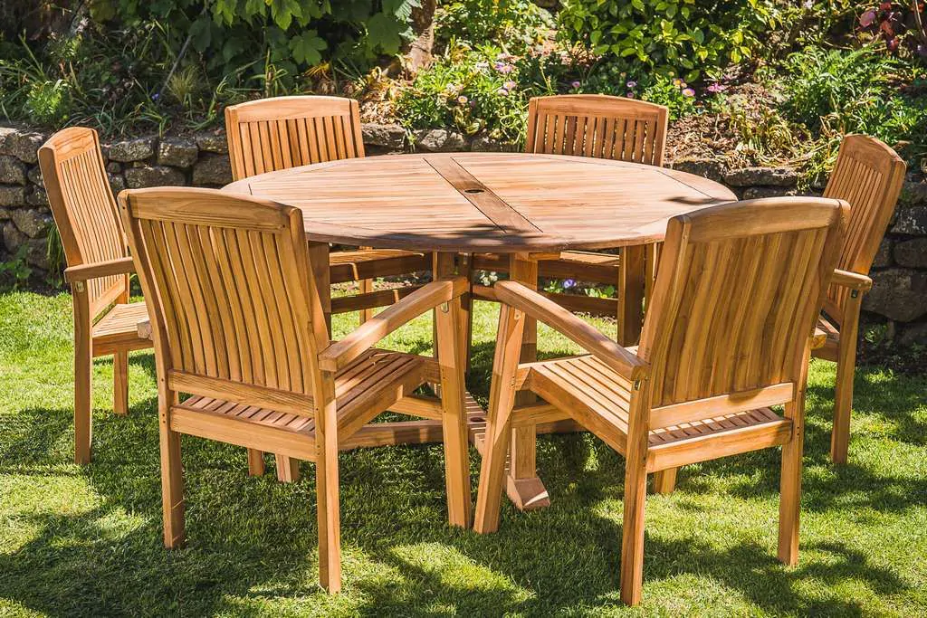 1.5m Round Solid Teak Pedestal Table with 6 Stacking Charlotte Chairs