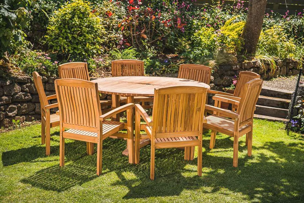 Solid Teak 1.5m Pedestal Table and 8 Charlotte Stacking chairs set