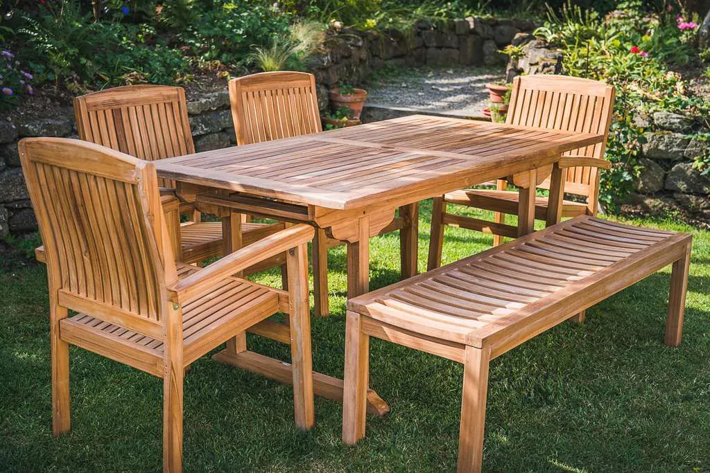 1.6m rectangular Pedestal Patio Set with 4 Charlotte Stacking Chairs and Backless Bench